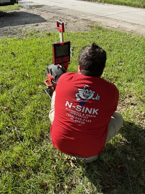 N-Sink running a camera inspection down a residential drain line
